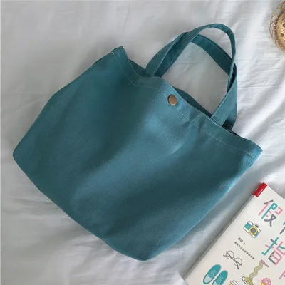 561 Borsa a tracolla in tela tinta unita con bottone a pressione, piccola borsa per il viaggio - Ciano