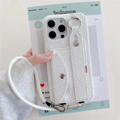 For iPhone 15 Pro Case Card Holder Wristband Lacquered Snake Texture PU + PC Back Cover with Lanyard - White