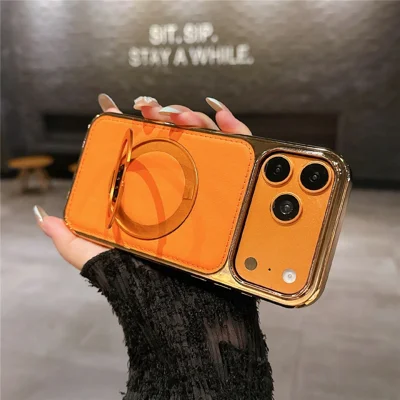 For iPhone 17 Pro Case Rotating Magnetic Kickstand Leather Coated PC + TPU Protective Cover - Orange