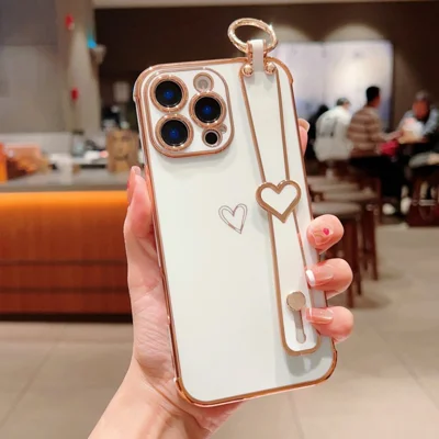 For iPhone 16 Pro Max Case Electroplated Heart Pattern TPU Phone Back Cover with Wristband Kickstand - Ivory White