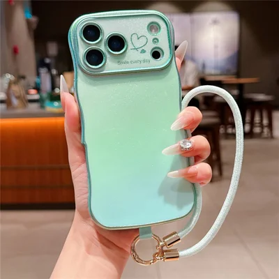 For iPhone 18 Pro Max / 17 Pro Max Case with Strap TPU Phone Back Cover Dazzling Design Curly Shape Love Heart - Colorful Green
