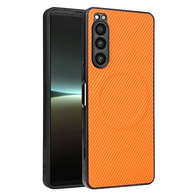 Funda para Sony Xperia 5 IV 5G, textura de fibra de carbono, revestimiento de cuero PU, carcasa de TPU y policarbonato con anillo metálico para soporte magnético de coche - Naranja