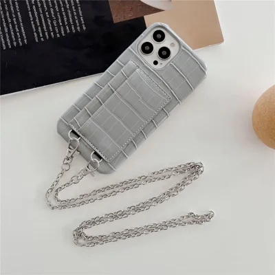 2 Card Slots Phone Case for iPhone 15 Pro Crocodile Textured PU+PC Anti-Drop Phone Protector with Strap - Grey