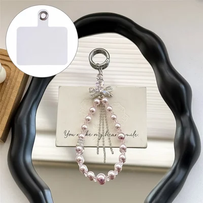 A1201X 30cm Phone Lanyard Pearl Tassel Butterfly Bow Crystal Dangle Phone Charm Wrist Strap with Removable Blank White Card - Pink