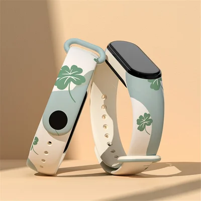 Für Xiaomi Mi Band 3 / Band 4 / Band 5 / Band 6 / Band 7 Muster bedrucktes Uhrenband, verstellbar, atmungsaktiv, weich, TPU-Armband - Kleeblatt