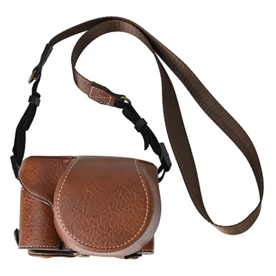 For Sony Alpha ZV-E10 Camera Case Litchi Texture Leather Cover with Battery Hole + Strap - Coffee