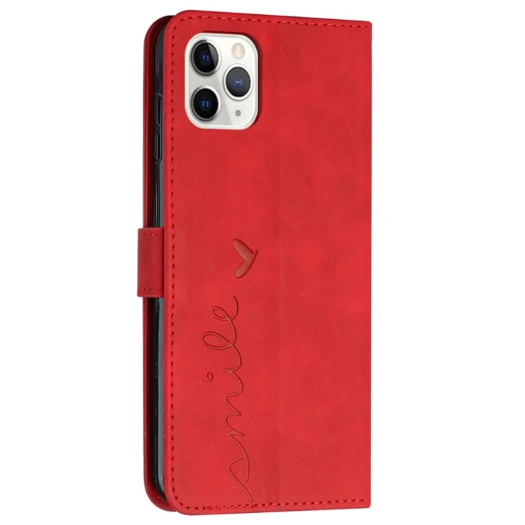 Heart Shape Imprinted Case for iPhone 12/12 Pro 6.1 inch, Anti-drop Skin-touch Feeling PU Leather Stand Wallet Phone Shell with Strap - Red
