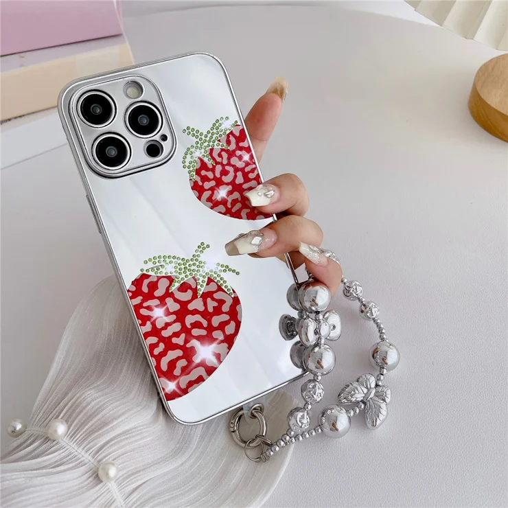 For iPhone 15 Pro Case IMD Silver Finish TPU+PC Rhinestones Decor Phone Cover with Bracelet Chain - Strawberry For iPhone 15 Pro Case IMD Silver Finish TPU+PC Rhinestones Decor Phone Cover with Bracelet Chain - Strawberry