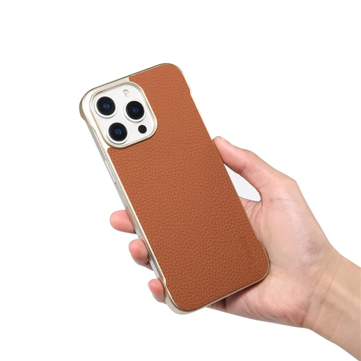 For iPhone 16 Pro Magnetic Case Litchi Texture Genuine Cow Leather + PC Boardless Phone Cover - Brown