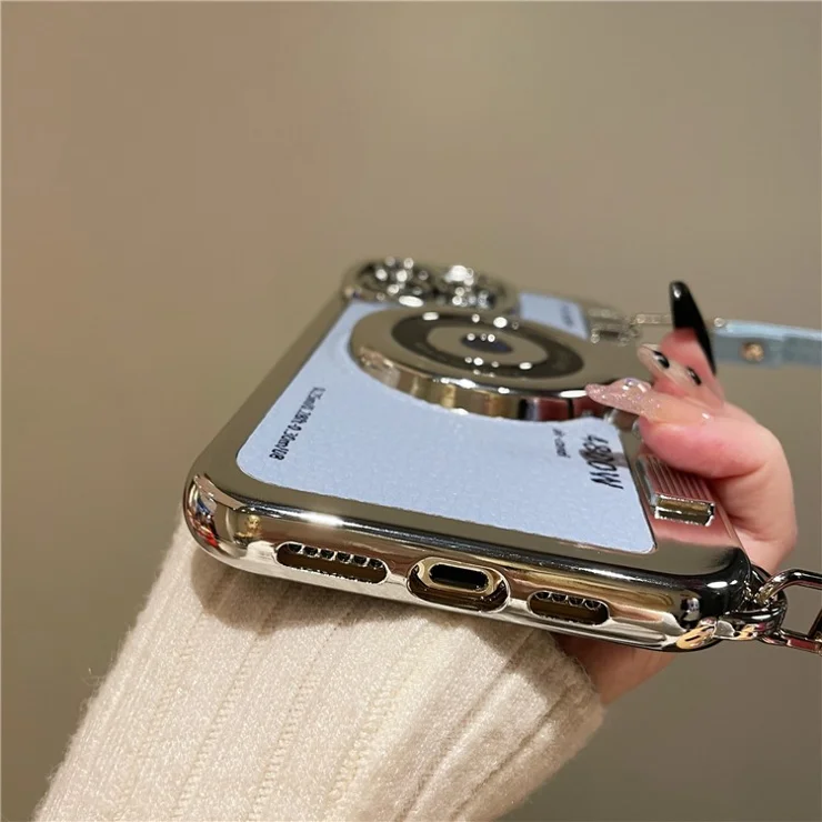 For iPhone 14 Pro Max Cases with Wrist Strap Electroplating Camera Shaped TPU Wholesale Phone Cover - Purple