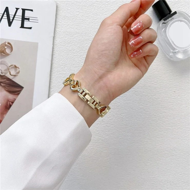 For Apple Watch Series 10 46mm / Ultra 2 Ultra 49mm / 9 8 7 45mm / SE (2023) SE (2022) SE 6 5 4 44mm / 3 2 1 42mm Metal Heart Bracelet Rhinestone Decor Watch Band Wrist Strap - Gold