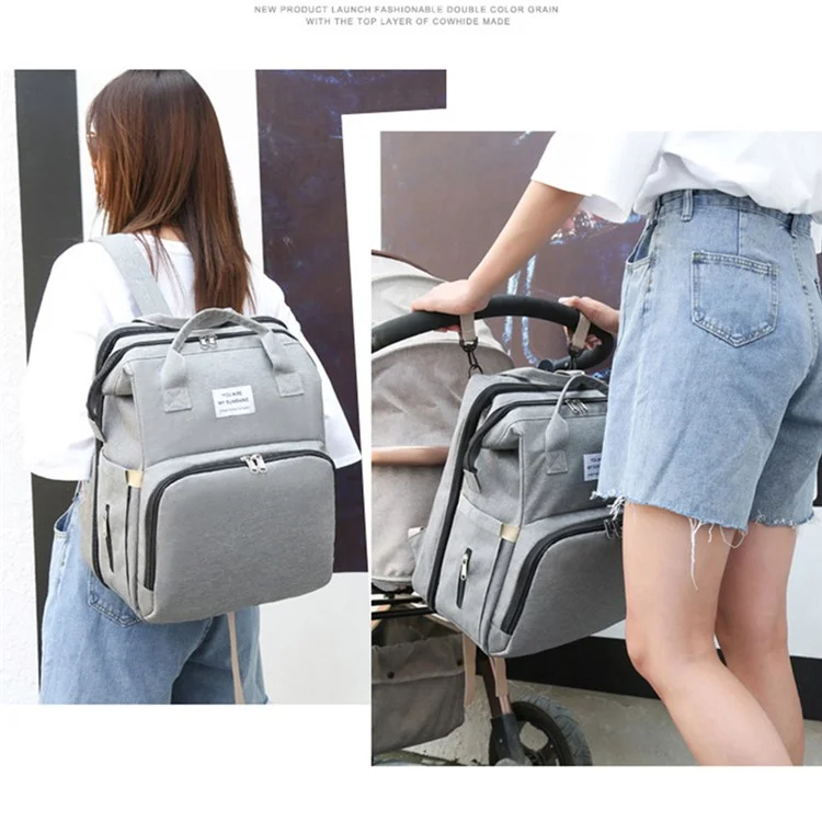 2006 Portable Outdoor Diaper Backpack Waterproof Mommy Maternity Bag Nappy Milk Bottle Carrying Bag with Folding Bed / Hook - Purple