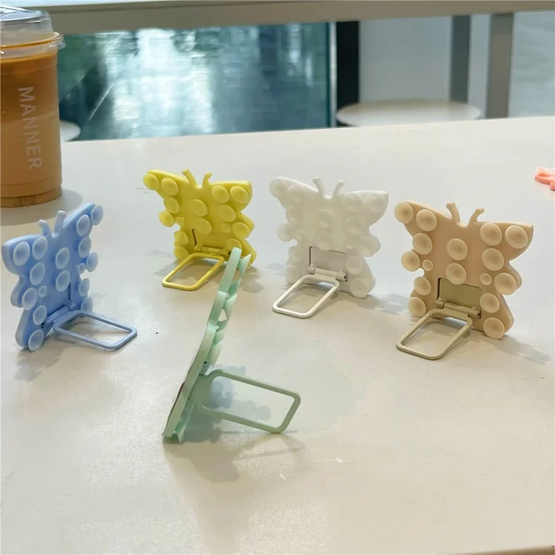 Support de téléphone portable en silicone en forme de papillon avec ventouse, support de bureau portable, support carré