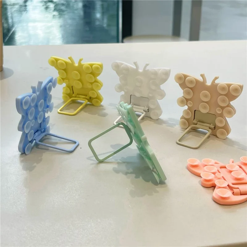 Support de téléphone portable en silicone en forme de papillon avec ventouse, support de bureau portable, support carré