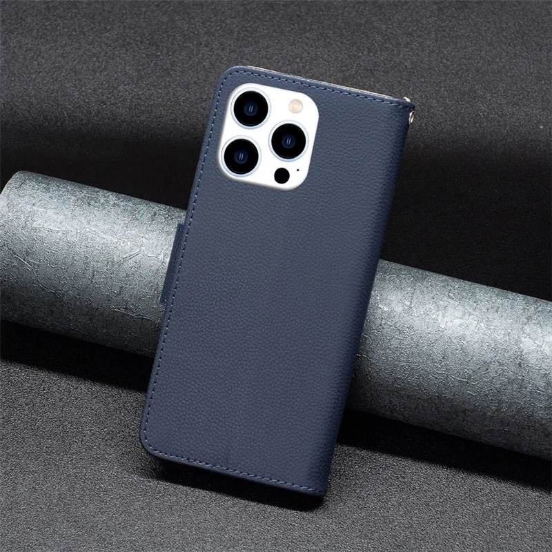 Custodia portafoglio per iPhone 14 Pro con texture effetto litchi, cover in pelle pieghevole con supporto e cinturino - Blu scuro