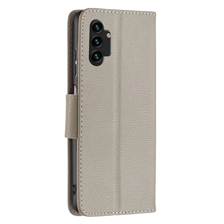 Für Samsung Galaxy A13 4G / A13 5G / A04 4G (164,4 x 76,3 x 9,1 mm) Magnetverschluss Litchi-Struktur PU-Leder-Geldbörse Einfarbige Handyhülle mit Gurt - Grau