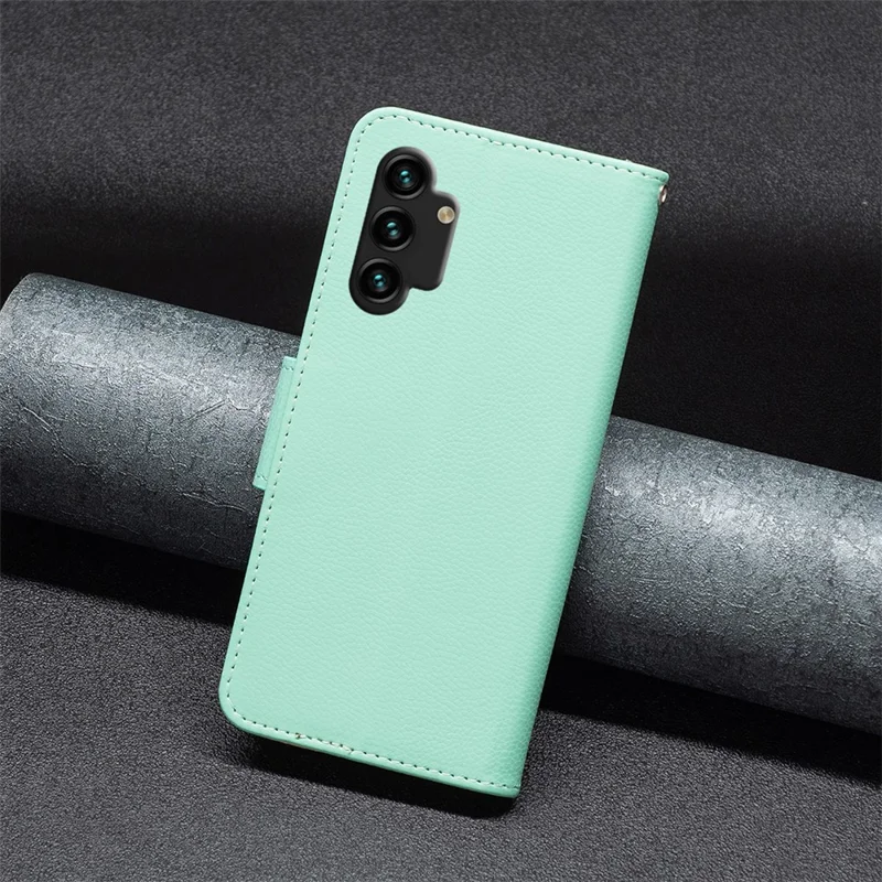 For Samsung Galaxy A13 4G / A13 5G / A04 4G (164.4 x 76.3 x 9.1 mm) Magnetic Closure Litchi Texture PU Leather Wallet Solid Color Cell Phone Cover with Strap - Green