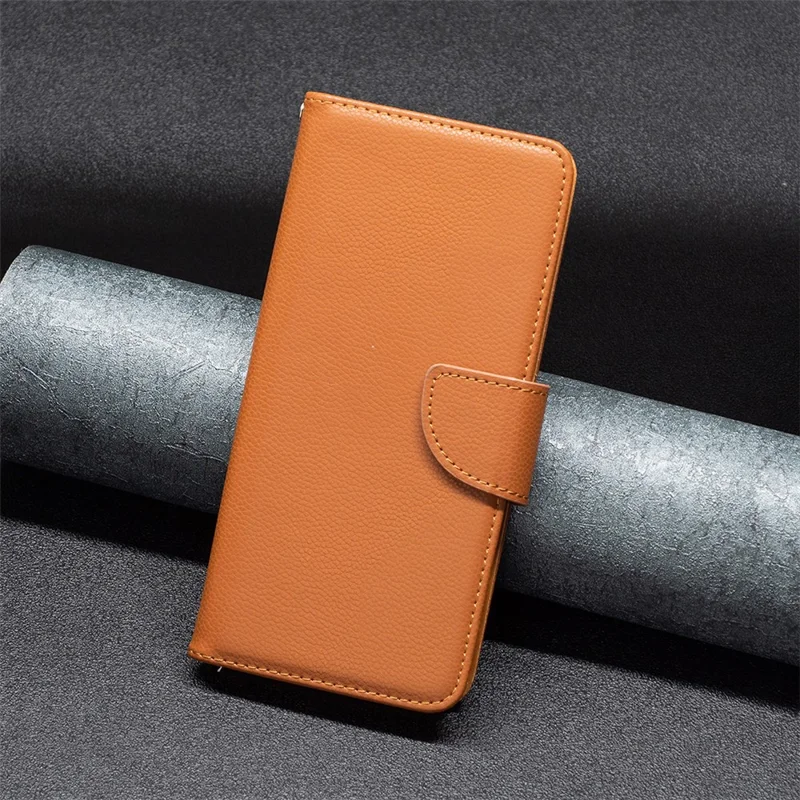 For Samsung Galaxy A13 4G / A13 5G / A04 4G (164.4 x 76.3 x 9.1 mm) Magnetic Closure Litchi Texture PU Leather Wallet Solid Color Cell Phone Cover with Strap - Brown
