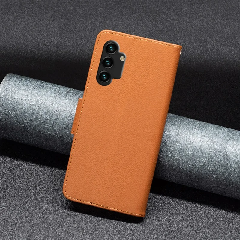 For Samsung Galaxy A13 4G / A13 5G / A04 4G (164.4 x 76.3 x 9.1 mm) Magnetic Closure Litchi Texture PU Leather Wallet Solid Color Cell Phone Cover with Strap - Brown