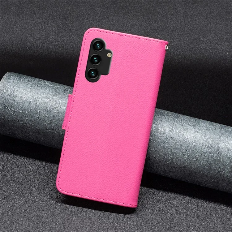 For Samsung Galaxy A13 4G / A13 5G / A04 4G (164.4 x 76.3 x 9.1 mm) Magnetic Closure Litchi Texture PU Leather Wallet Solid Color Cell Phone Cover with Strap - Rose