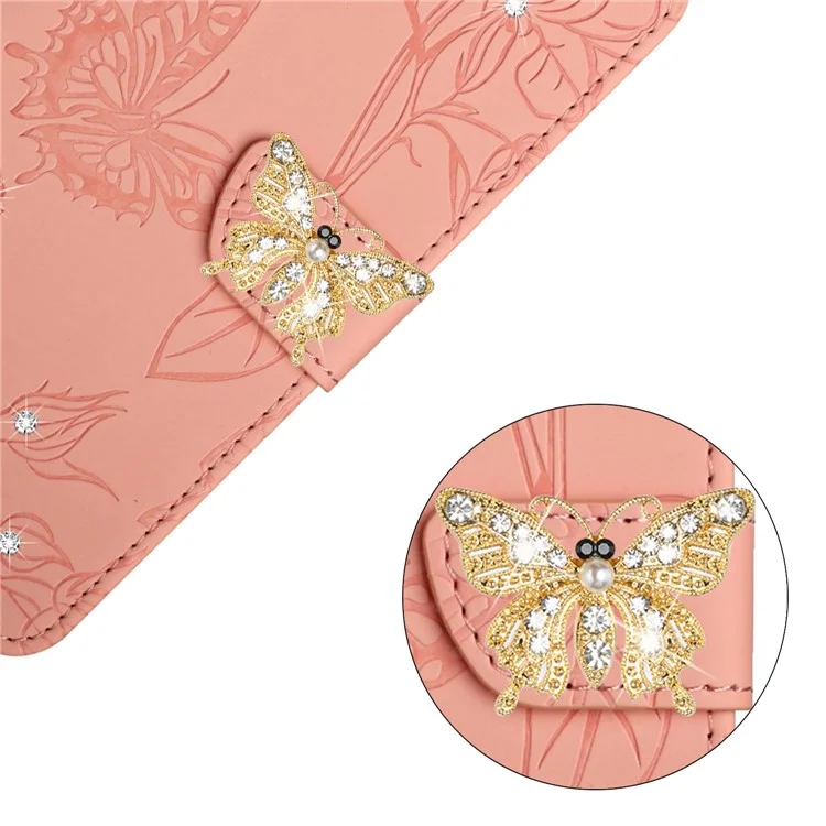 For Samsung Galaxy M13 4G Butterfly Flowers Imprinted Rhinestone Decor Phone Cover Wallet Stand Well-protected Leather Case with Shoulder Strap - Pink