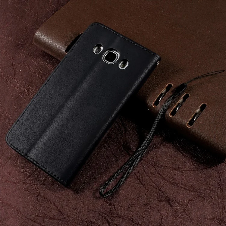 For Samsung Galaxy J5 (2016) SM-J510 Pebble Grain Leather Stand Casing with Strap - Black
