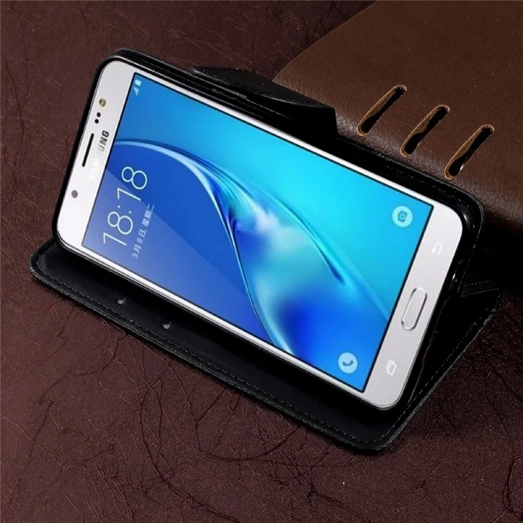 For Samsung Galaxy J5 (2016) SM-J510 Pebble Grain Leather Stand Casing with Strap - Black