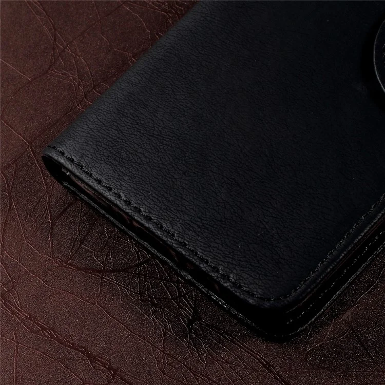 For Samsung Galaxy J5 (2016) SM-J510 Pebble Grain Leather Stand Casing with Strap - Black