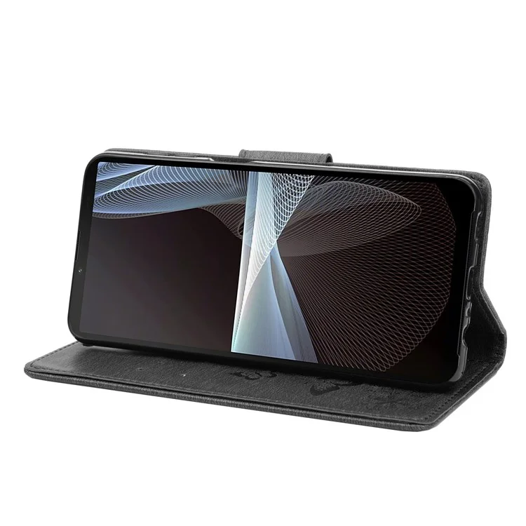 Für Sony Xperia 10 IV Scratch Proof Wallet Hülle Schmetterlingsblume Eingeprägte PU Lederständer Flip Cover Mit Handgurt - Schwarz