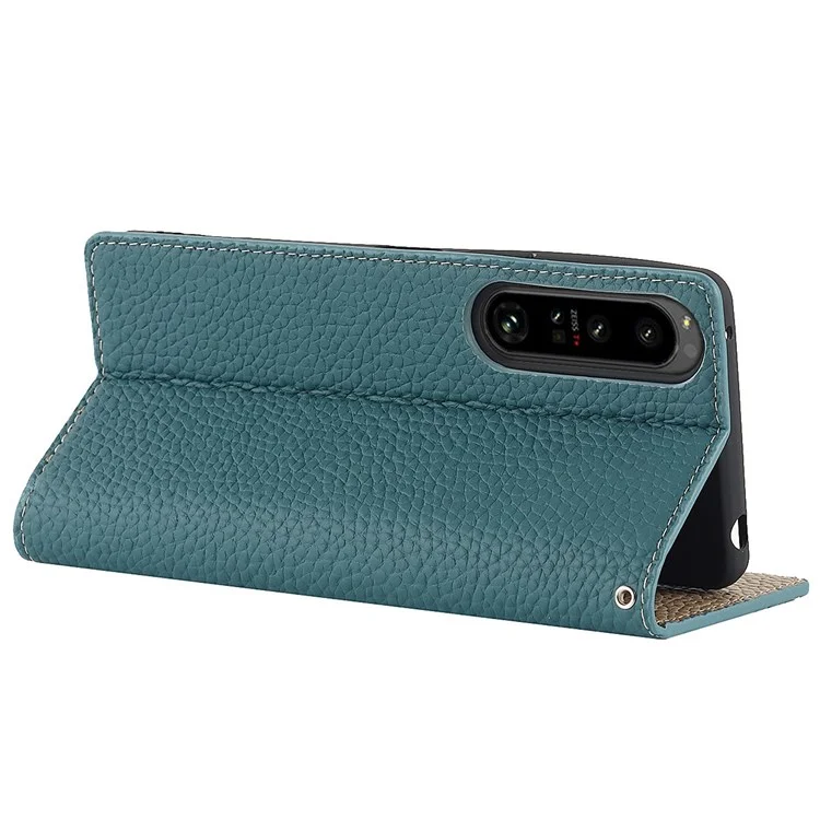 Para Sony Xperia 1 IV 5G Cubierta Completa Litchi Textura Case de Teléfono de Cuero Genuino Soporte de Protección Anti-caza Con Correa de Muñeca - Bebe Azul