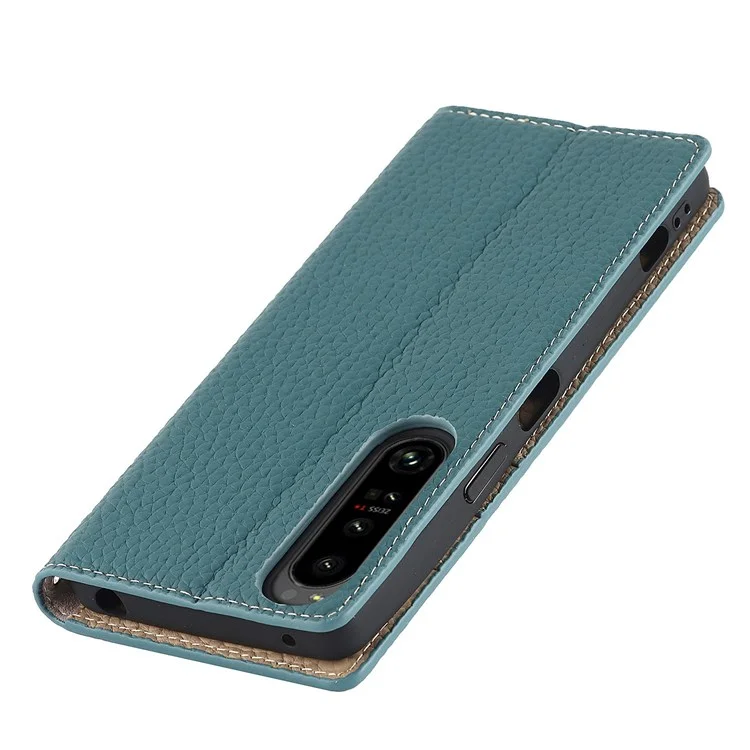Para Sony Xperia 1 IV 5G Cubierta Completa Litchi Textura Case de Teléfono de Cuero Genuino Soporte de Protección Anti-caza Con Correa de Muñeca - Bebe Azul