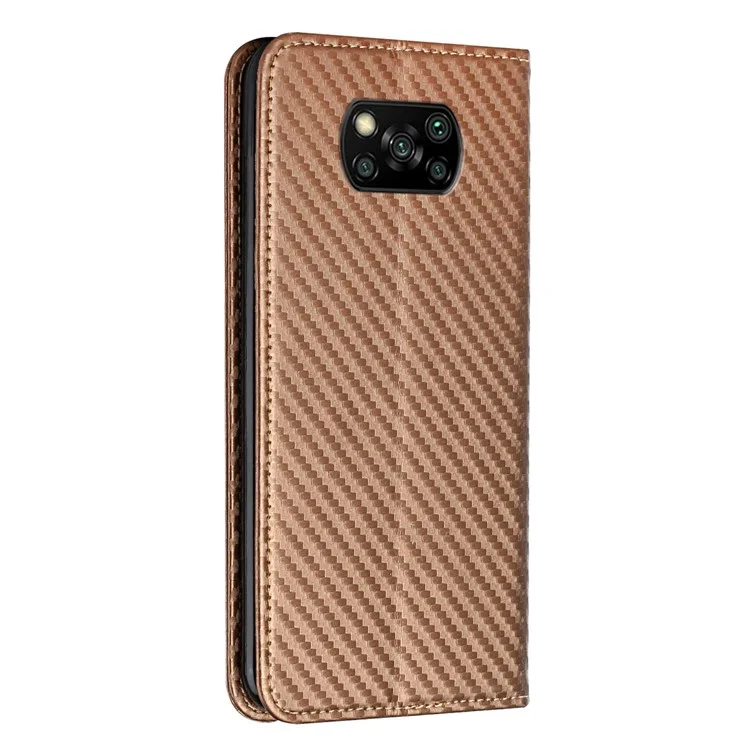 Funda De Fibra De Carbono Anti-arañazos Flip Magnético Autorbido Automático De La Carpeta PU Funda De Cuero De La PU Con La Correa De Mano Para Xiaomi POCO X3 / POCO X3 NFC / POCO X3 PRO - Marrón