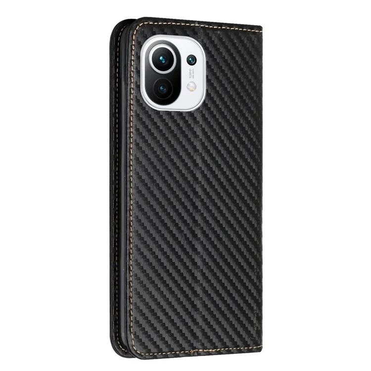 Flip Design Magnetic Auto-absorbed Carbon Fiber Texture Stand Wallet PU Leather Case Cover with Hand Strap for Xiaomi Mi 11 Lite 4G/5G/11 Lite 5G NE - Black