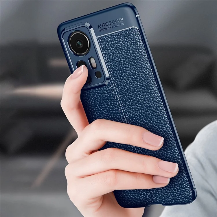 Capa Protetora Flexível TPU Anti-Impressão Digital com Textura de Lichia, Ultra Fina e com Absorção de Choques para Xiaomi 12 Pro 5G / 12S Pro 5G /12 Pro (Dimensity) 5G - Preta