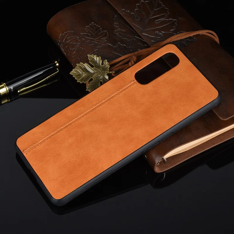 PU Leather Coated PC + TPU Hybrid Phone Case for Oppo Find X2 - Yellow