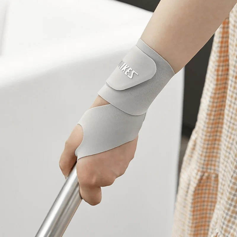 AOLIKES 7935 1Pc Wrist Guard Sprained Wrist Fixing Strap Sports Fitness Thin Summer Wrist Band - Grey M