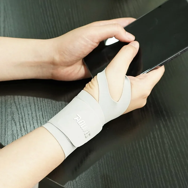 AOLIKES 7935 1Pc Wrist Guard Sprained Wrist Fixing Strap Sports Fitness Thin Summer Wrist Band - Grey M
