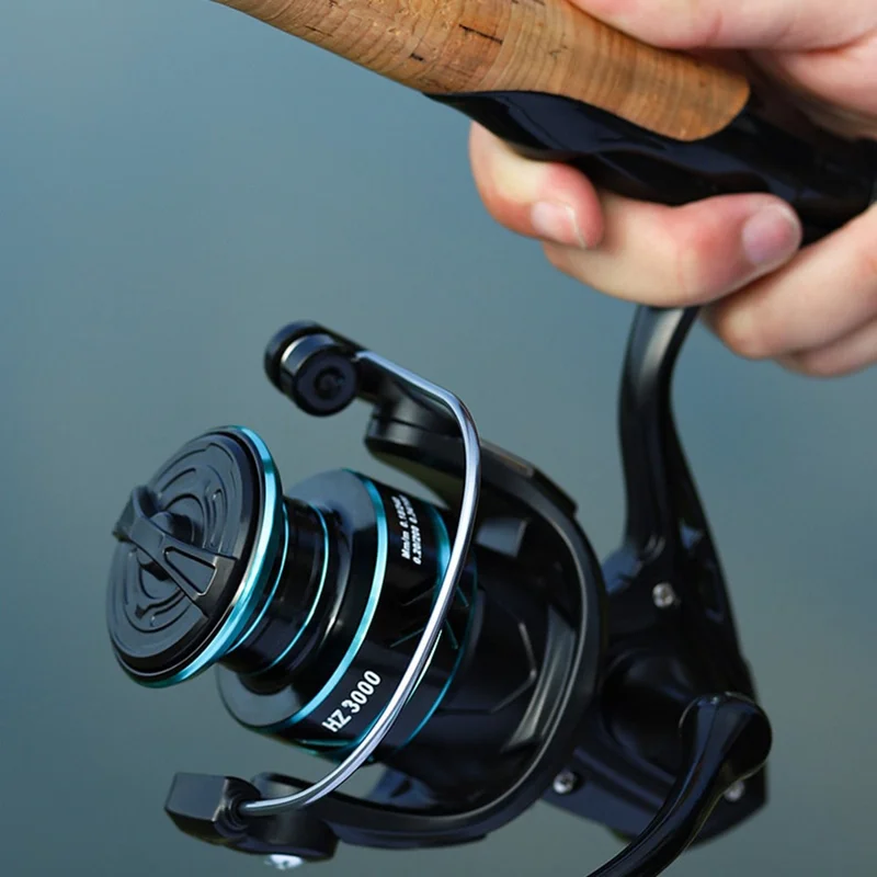 CORALOV HZ-6000 Fishing Spinning Reel for Saltwater Surf Casting Fishing Wheel with Metal Handle Grip