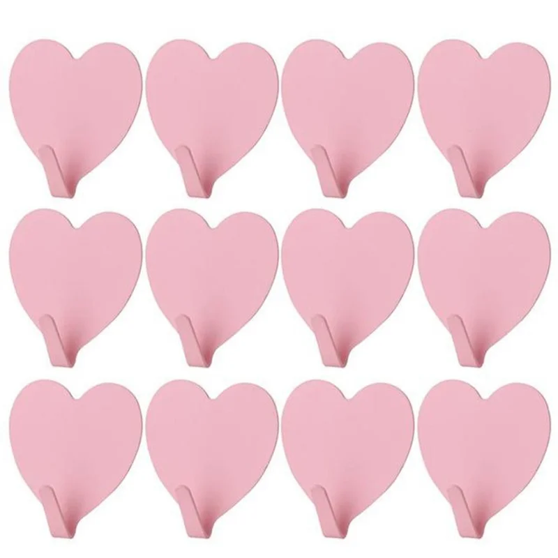 E711 12 st järn väggmonterade krokar hjärtformade påklistrade hängare dekorativa krokar för hem, kök (med påklistrad etikett) - Ljusrosa