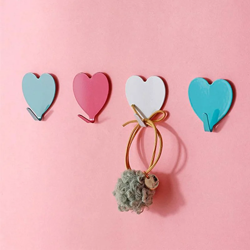 E711 12 st järn väggmonterade krokar hjärtformade påklistrade hängare dekorativa krokar för hem, kök (med påklistrad etikett) - Ljusrosa