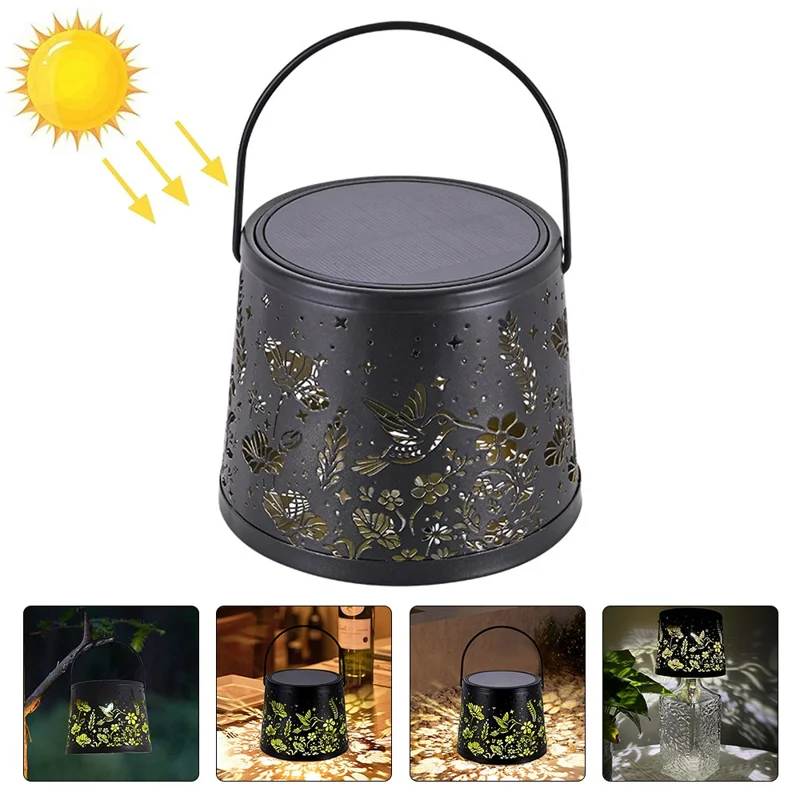 Lampe décorative solaire d'extérieur en forme de bouteille de vin avec motif d'oiseau et de fleur ajouré, créant une atmosphère suspendue