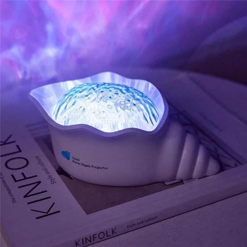 Y-10 Projecteur de Nuit en Forme de Coquille Conque, Lampe de Projection avec Effet d'Ondulation d'Eau Dynamique et Bruit Blanc Intégré, 2000 mAh, pour Chambre à Coucher