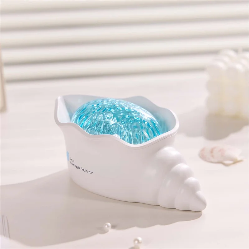 Y-10 Projecteur de Nuit en Forme de Coquille Conque, Lampe de Projection avec Effet d'Ondulation d'Eau Dynamique et Bruit Blanc Intégré, 2000 mAh, pour Chambre à Coucher