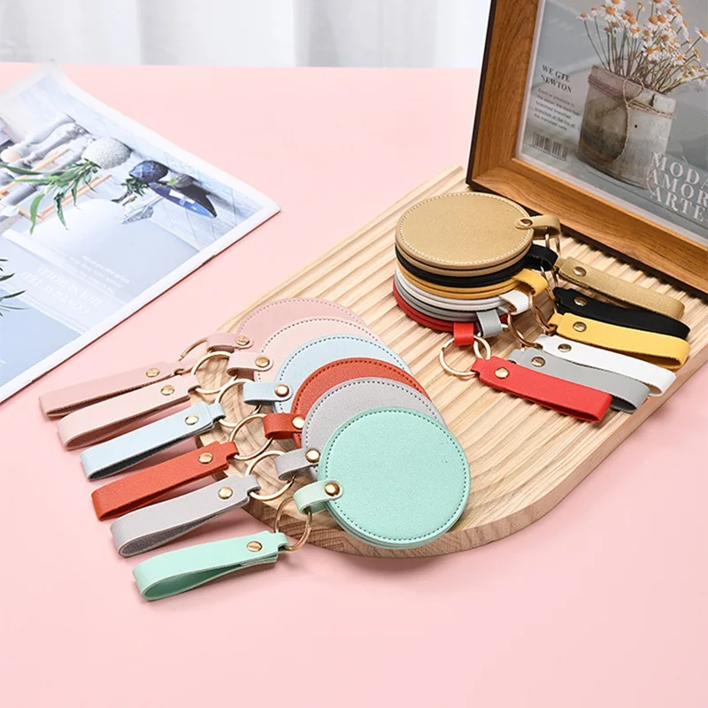 Round Shape Pocket Mirror with Keychain PU Leather Cosmetic Mirror Rotating Mini Makeup Mirror Hanging Ornament - Orange