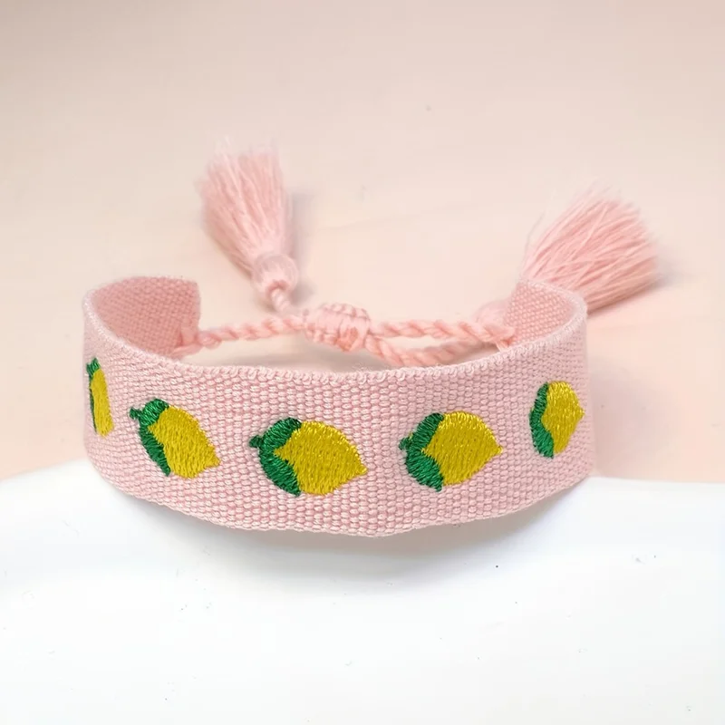 Bohemia Woven Bracelet Embroidered Lemon Pattern Wristband with Tassel Decor for Women - Pink