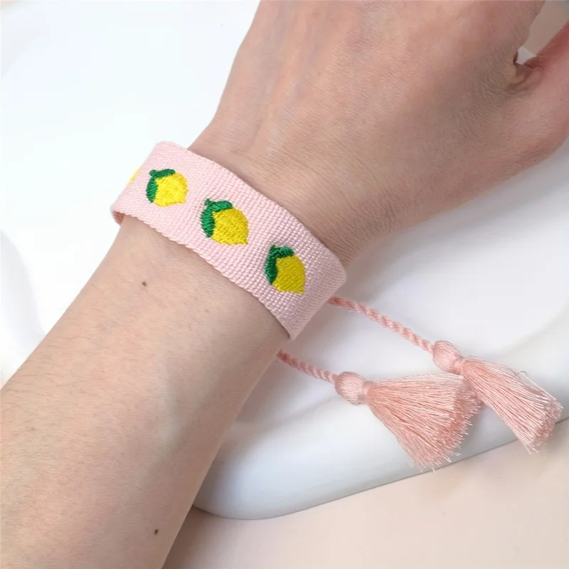 Bohemia Woven Bracelet Embroidered Lemon Pattern Wristband with Tassel Decor for Women - Pink
