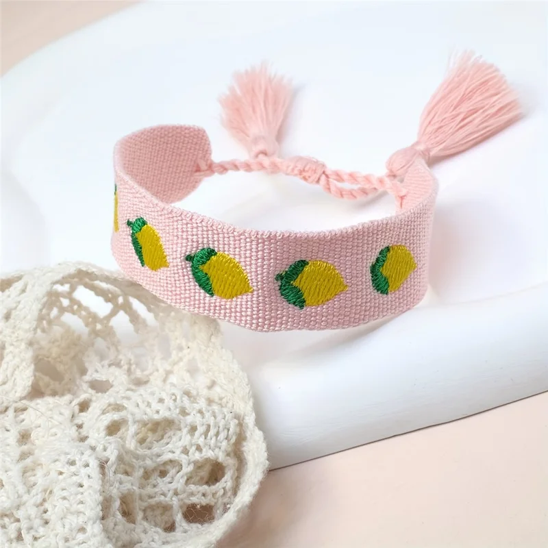 Bohemia Woven Bracelet Embroidered Lemon Pattern Wristband with Tassel Decor for Women - Pink