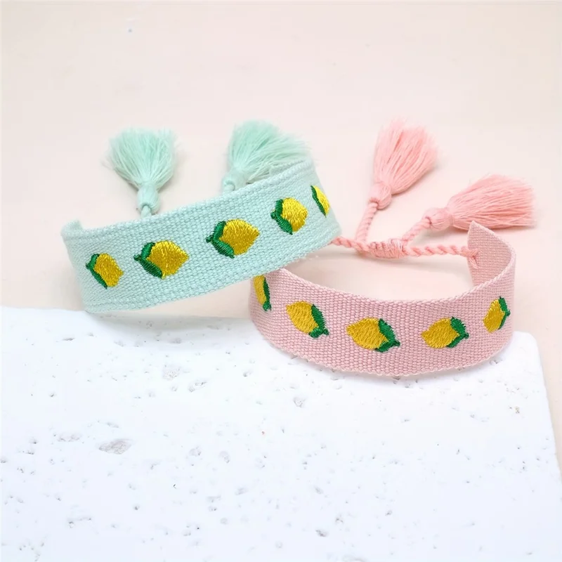 Bohemia Woven Bracelet Embroidered Lemon Pattern Wristband with Tassel Decor for Women - Pink