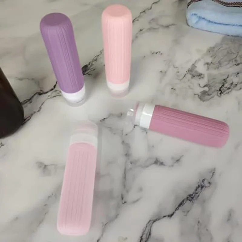 4-teiliges Set Reiseflaschen 90 ml, Silikon-Refill-Druckflaschen, auslaufsicher für Shampoo, Lotion – Rosa