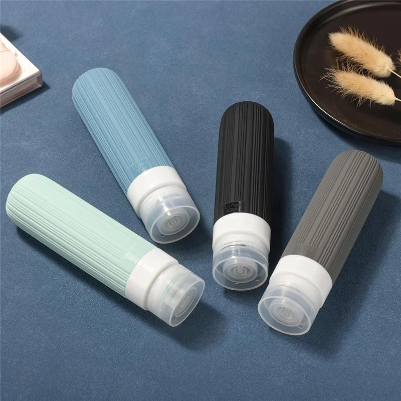 4-teiliges Set Reiseflaschen 90 ml, Silikon-Refill-Druckflaschen, auslaufsicher für Shampoo, Lotion – Rosa